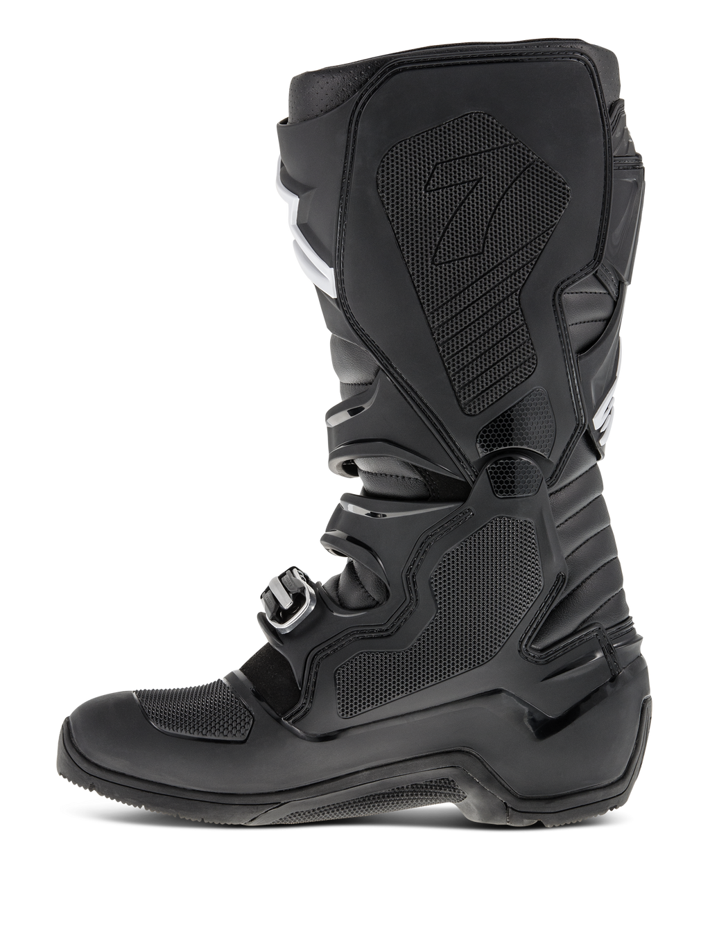 Alpinestars Tech 7 Enduro Boots, Black, side profile view highlighting the medial side with honeycomb rubber insert, protective TPU panels and buckle closure system for off-road motocross performance.