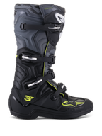 Alpinestars Tech 5 Boots, Motocross Off-Road Boots, side profile view, Black and Cool Gray with Yellow Fluo accents, featuring camouflage pattern, adjustable buckles, and rugged protective sole.