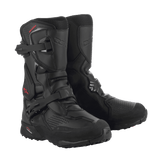 A pair of black/black XT-8 Gore-Tex high-top adventure enduro boots by Alpinestars EU, featuring red detailing. These boots boast a reinforced design with protective buckles and a rugged sole for enhanced grip. The Alpinestars logo is visible on the side, and the durable material makes them perfect for off-road riding.