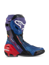 Alpinestars Supertech R LE Martinator R01 Vented Boots, high-performance racing motorcycle boots, vibrant blue purple and red colorway, featuring a perforated microfiber chassis, prominent white Alpinestars logo on the shin plate, and a reinforced red heel protector