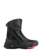 Alpinestars RT-7 Drystar Boots, Motorcycle Touring Boots, Black with Red Sole Accent, Waterproof and Breathable, Side Profile featuring Lateral Zip and Hook-and-Loop closure, Textured Textile Panels with Reflective Dots, Rugged Lugged Sole, Advanced Synthetic Construction