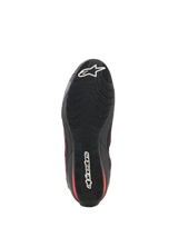 Alpinestars Celer Superair Shoes, Motorcycle Riding Shoes, Black and Bright Red, bottom view showing the black oil-resistant rubber outsole with a textured wavy grip pattern and white Alpinestars branding on the toe and heel