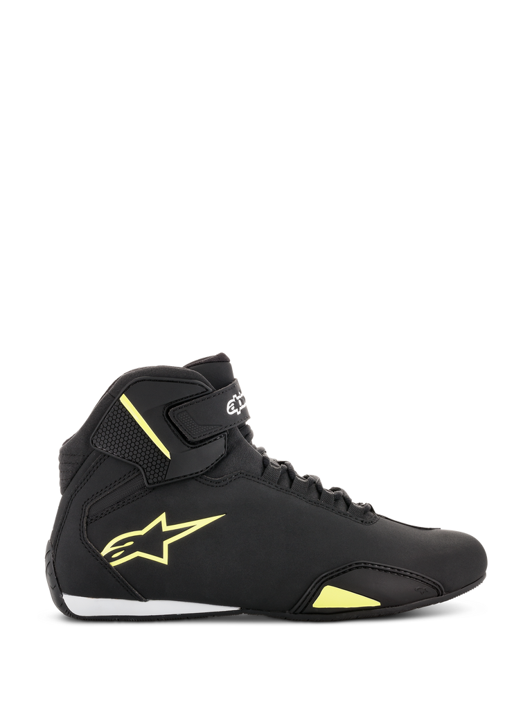 Alpinestars Sektor Shoes, Motorcycle Riding Shoes, Black and Yellow Fluorescent, side view showing yellow star logo, ankle strap with branding, and white heel accent on a sleek microfiber upper.