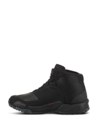 Alpinestars CR-X Drystar Riding Shoes, Motorcycle Riding Shoes, Black, side profile view, high-top design with running shoe silhouette, featuring reinforced TPU gear shift zone, lugged outsole for grip, and waterproof construction for urban and road riding.