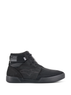 Alpinestars Primer Riding Shoes, Black Motorcycle Sneakers, High-Top Urban Riding Footwear, profile view, textured mesh upper, thick rubber sole, modern sporty design with a subtle star logo
