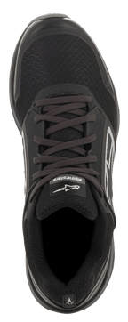 Alpinestars Meta Trail Shoes, Black and Dark Gray, top-down view, black mesh upper with laces, white Alpinestars logo on the tongue, performance paddock and running-inspired footwear