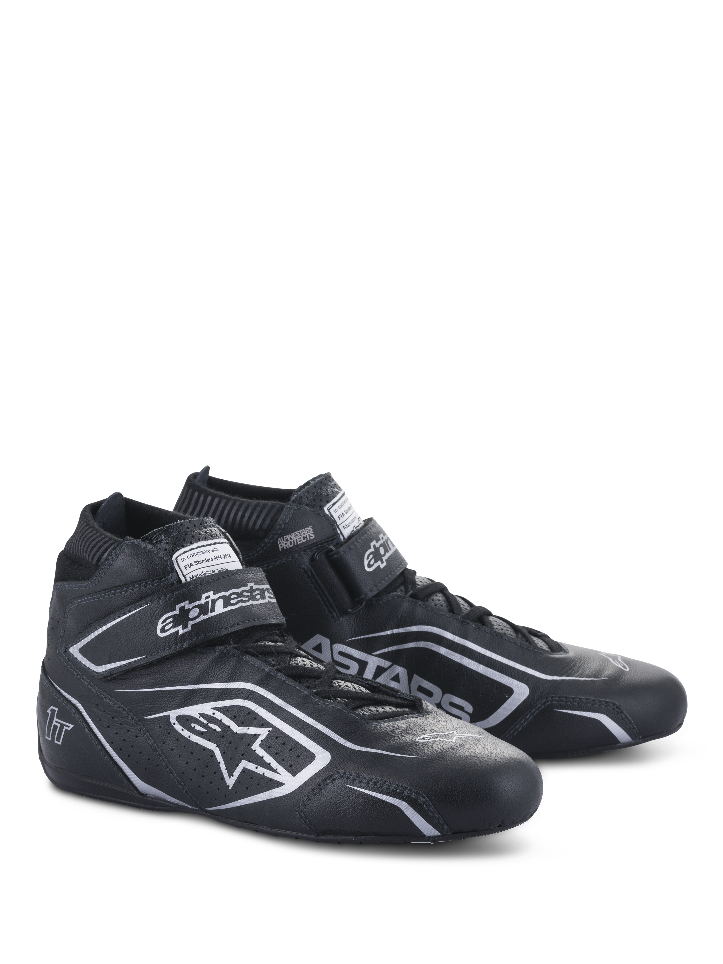 Alpinestars Tech-1 T V3 Shoes FIA, Auto Racing Shoes, Black and Silver, bovine leather construction with silver Alpinestars logos and branding, side-angled view featuring hook-and-loop strap and lace-up closure