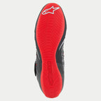 Alpinestars Tech-1 KX V3 Shoes, sole view, bright red thin rubber outer sole with textured grip pattern, white Alpinestars star logo on the heel and embossed branding, professional karting footwear
