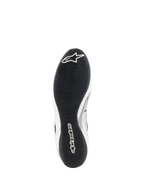 Alpinestars Tech-1 Z V3 Shoes FIA, Auto Racing Shoes, White and Black, bottom view showing the F1-derived thin rubber outsole with asymmetric tread, white Alpinestars logo on the toe and branding on the heel