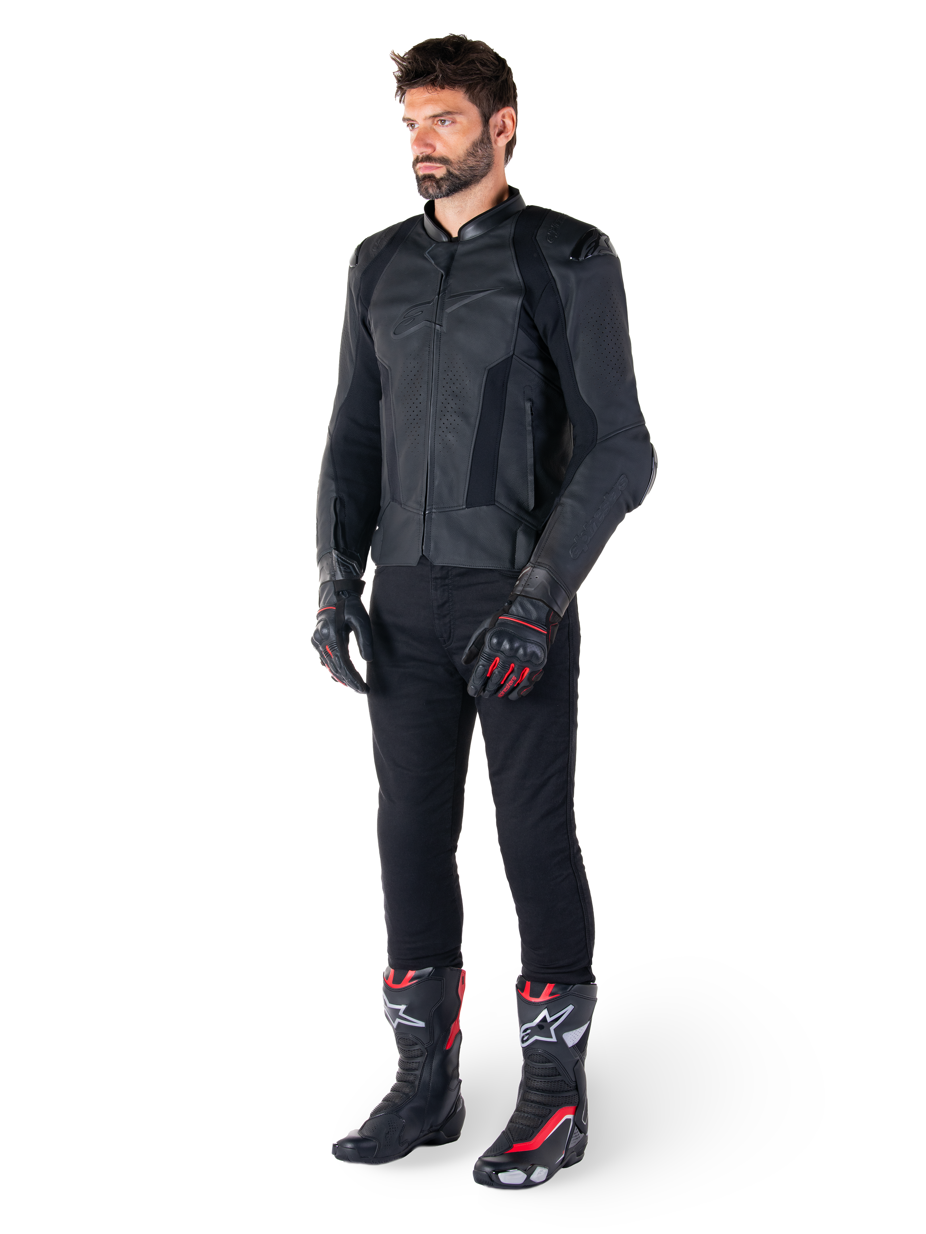 Alpinestars Missile V3 Leather Jacket, Black, worn by a rider with black pants and black and red racing gloves and boots, featuring perforated leather panels and sleek monochromatic branding, professional racing sport aesthetic