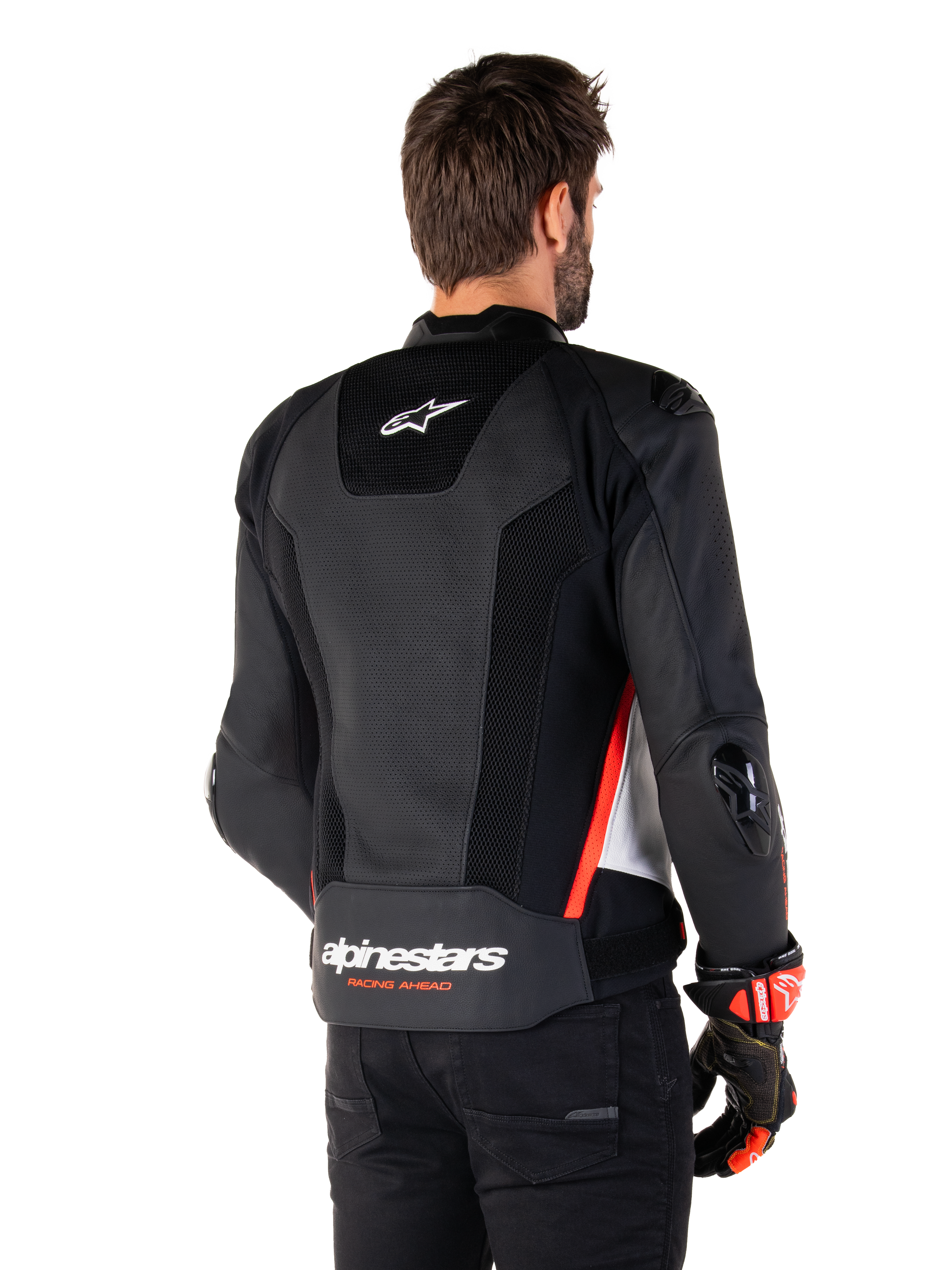 Alpinestars Missile V3 Airflow Leather Jacket, Rear View, Black White and Red Fluo, featuring extensive perforations for cooling, external DFS sliders on shoulders and elbows, and Alpinestars branding on the lower back.