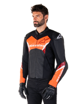 Alpinestars Faster V3 Leather Jacket, Black and Red Fluo, premium sport riding jacket with white and red accents, Alpinestars branding on chest and sleeves, worn with black motorcycle gloves and pants.