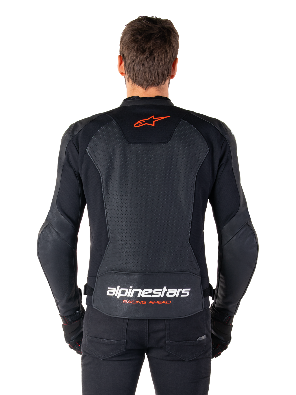 Alpinestars Faster V3 Airflow Leather Jacket, Black, rear view featuring perforated leather panels for ventilation, red Alpinestars star logo, and white branding on the lower back, worn with black pants and gloves.