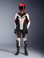 Alpinestars GP Force V2 Leather Suit - 1Piece, White Black and Red Fluo, full racing gear including red helmet, black gloves and boots, featuring aerodynamic design and Alpinestars branding on chest and knees