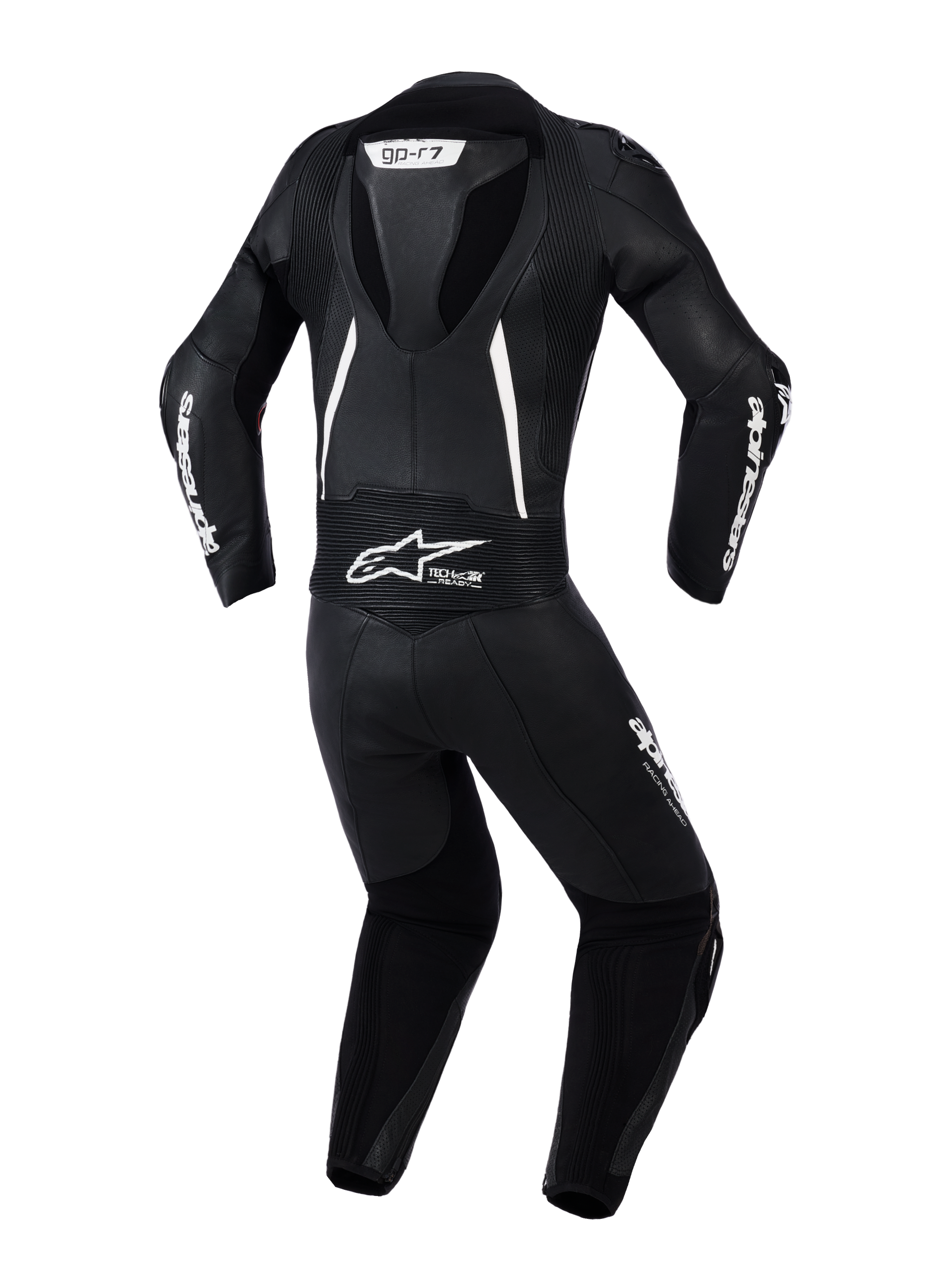 Alpinestars Woman Stella GP-R7 2-Piece Leather Suit, back view in Black with white accents, featuring an integrated aerodynamic hump, accordion stretch panels on shoulders and lower back, perforated leather for ventilation, and prominent Alpinestars branding.