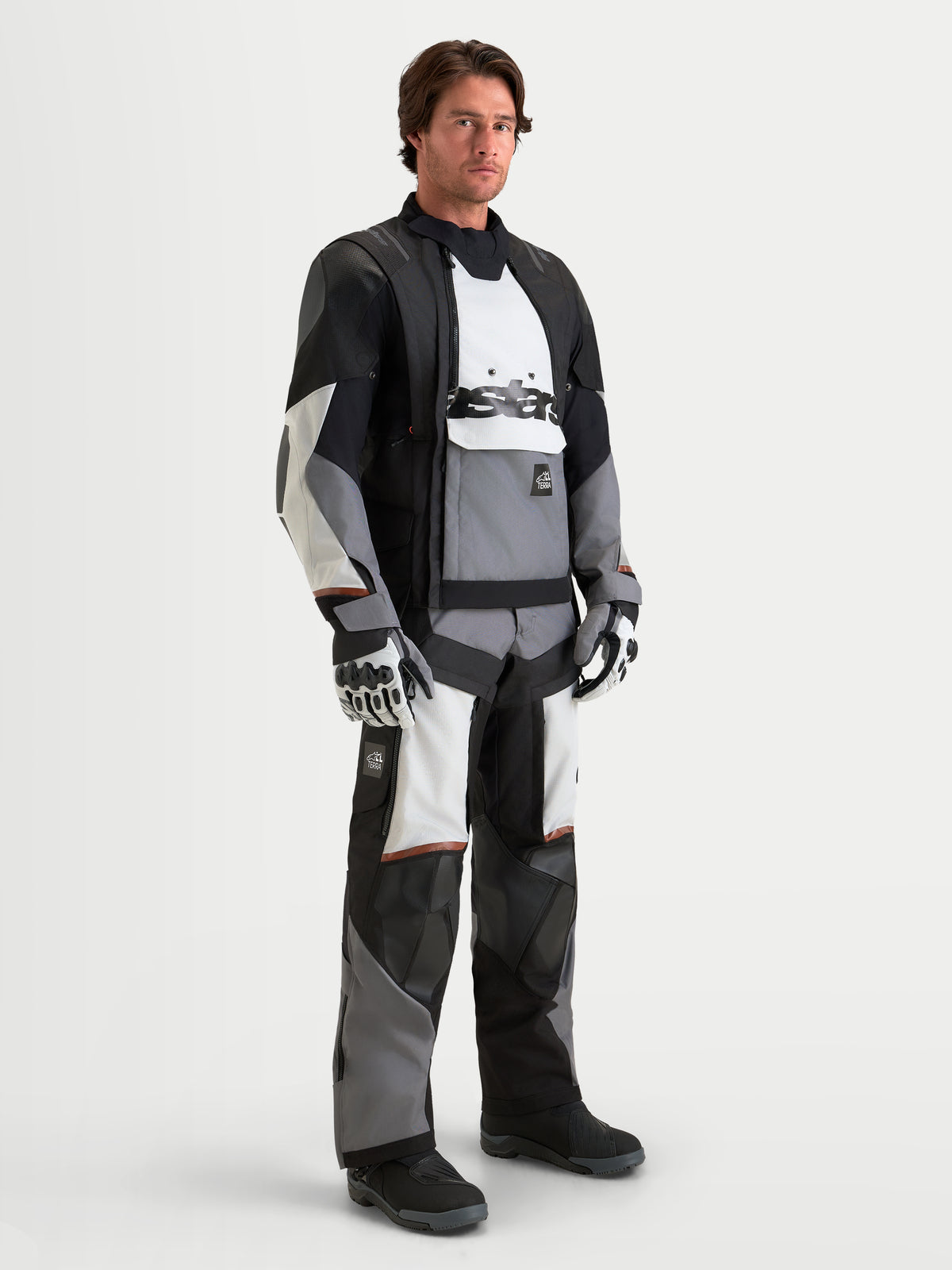 Alpinestars Harok V2 Drystar Jacket, Men's adventure motorcycle jacket in dark gray, ice gray, and black, featuring CE-certified protection and waterproof modular construction worn by a model