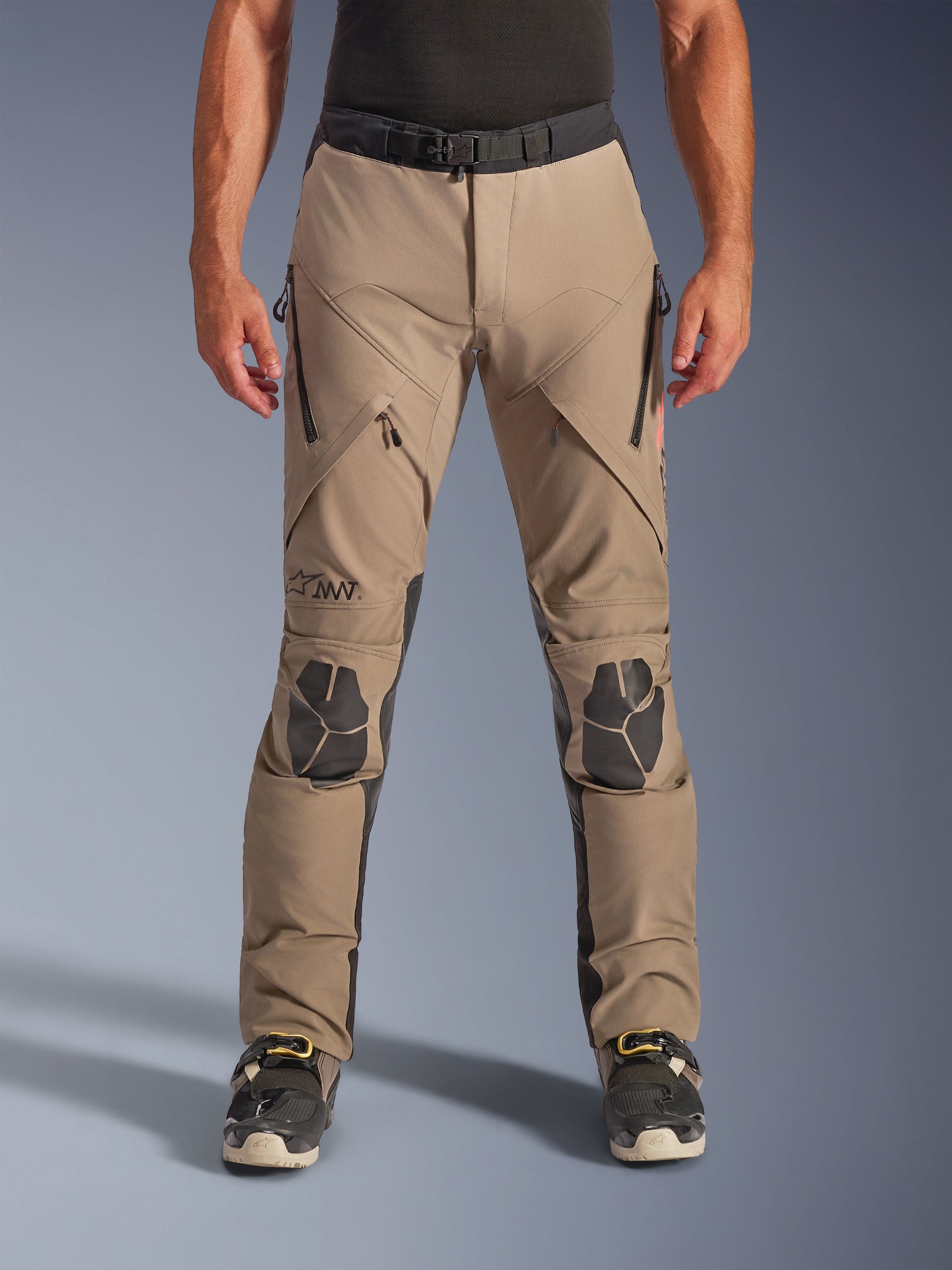 Alpinestars AMT-8 Stretch Drystar® XF Pants, Walnut and Black adventure pants, featuring zippered thigh vents, black reinforced knee panels, and an adjustable waist belt, designed for all-weather touring.