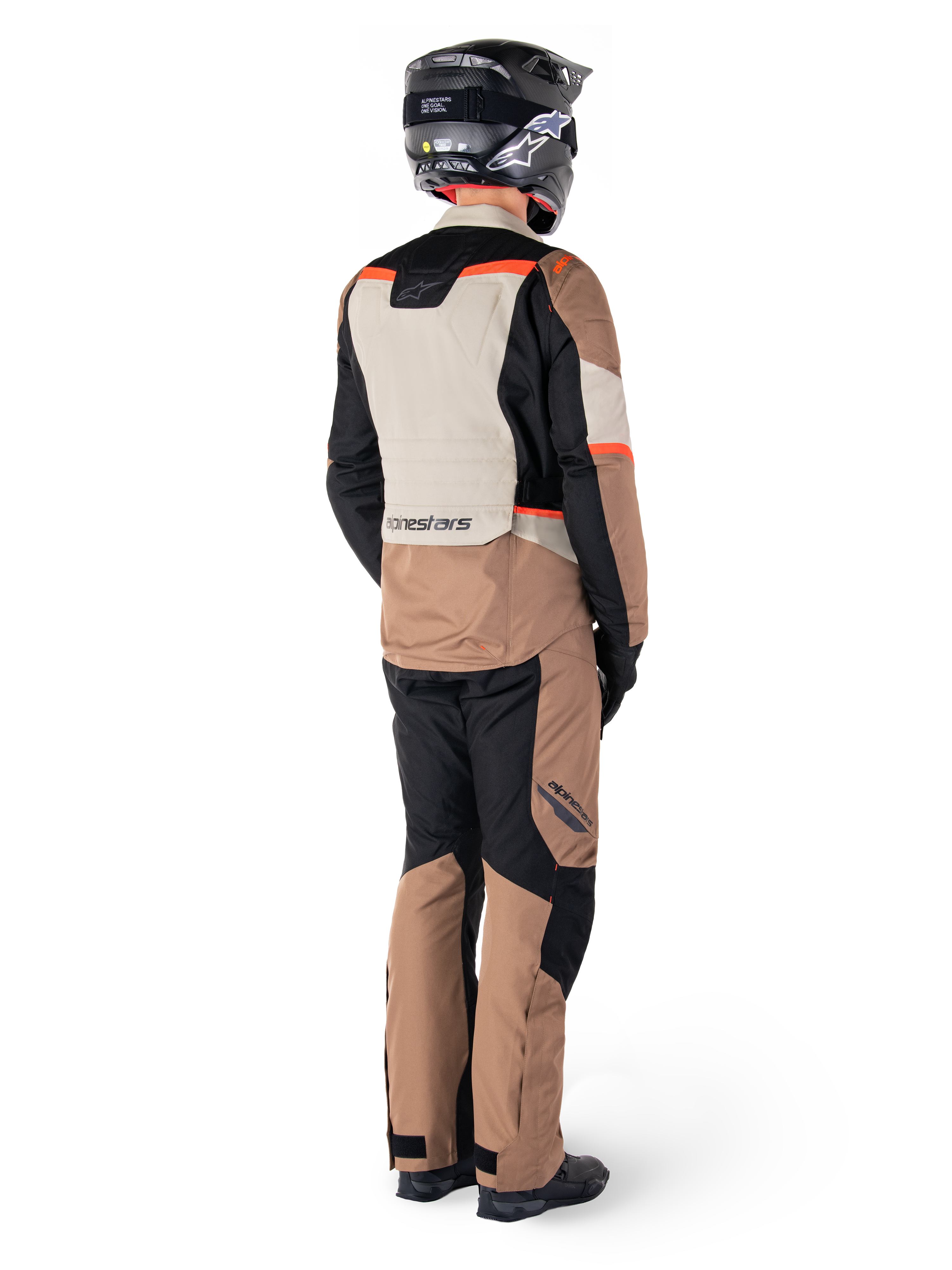 Alpinestars ST-1 Waterproof Jacket, Adventure Touring Jacket, Dark Khaki Sand Black Red Fluo, Rear view worn with matching pants and black helmet, featuring color-blocked panels and red fluorescent accents.