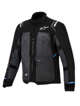Alpinestars Cusco Drystar® Jacket, Adventure Touring Jacket, Black and Deep Gray, featuring ripstop textile panels, white Alpinestars branding on the chest and shoulders, multiple ventilation zippers, and light blue accents.