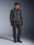 Alpinestars Cusco Drystar® Jacket in Black and Deep Gray, technical motorcycle touring jacket with multi-tonal panels, worn with matching black riding pants and gloves, designed for road and adventure touring.