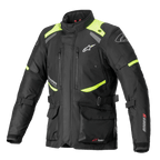 Alpinestars Andes V3 Drystar Jacket, Motorcycle Touring Jacket, Black with Fluorescent Yellow accents, featuring zippered chest vents, large front cargo pockets, adjustable waist straps, and Alpinestars branding, technical waterproof adventure gear