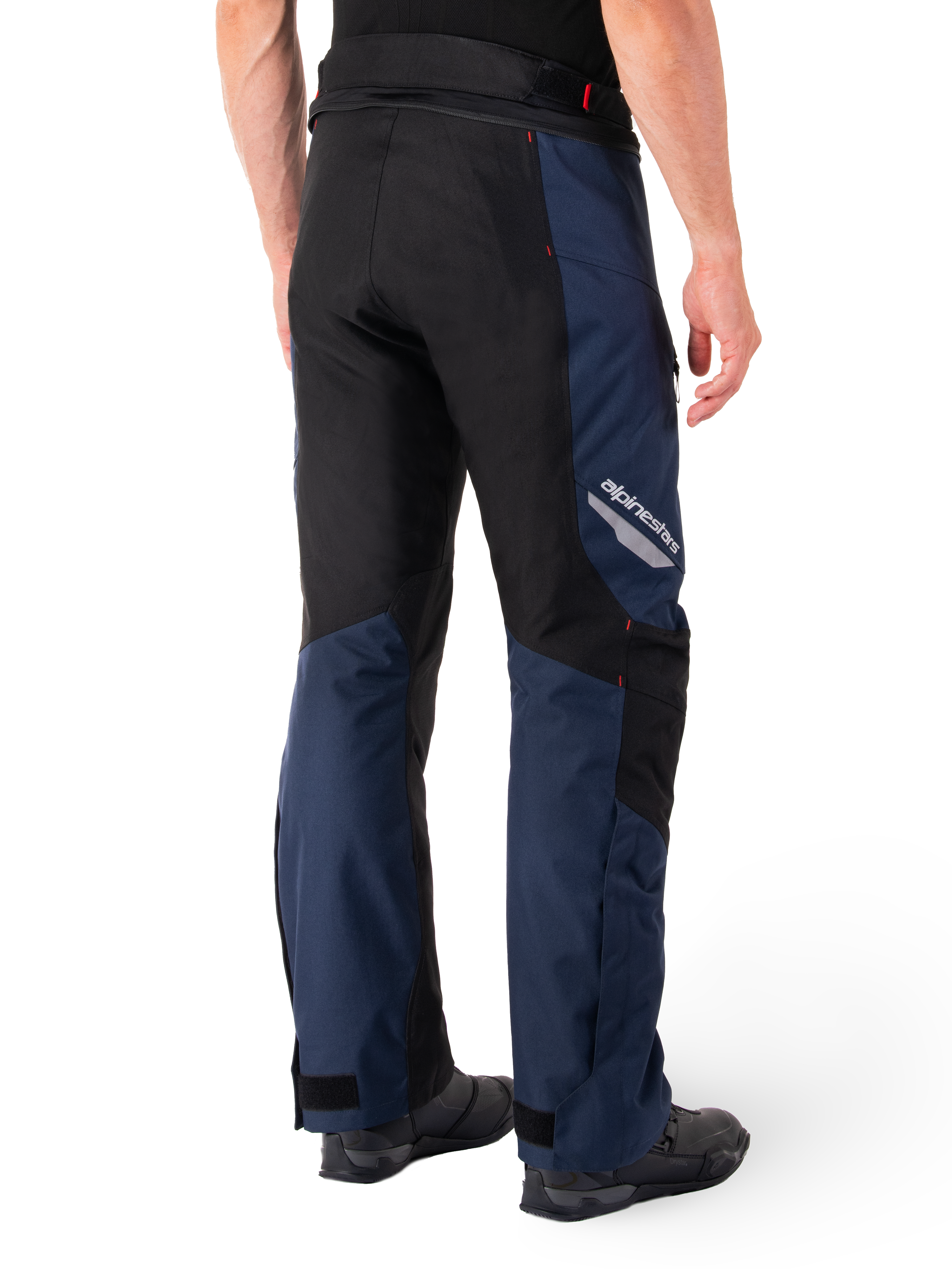 Alpinestars St-1 Waterproof Pants, Dark Blue Black and Bright Red, rear view showing black contrast panels, reflective Alpinestars logo on the side thigh, and ergonomic fit for motorcycle touring