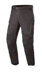 Alpinestars Raider V2 Drystar® Pants, Black Motorcycle Touring Pants, waterproof textile construction with accordion knee panels, zippered pockets, and adjustable waist, durable design for all-weather road riding