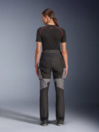 Alpinestars Stella Andes V4 Drystar® Pants, Women's Motorcycle Pants, Black and Dark Gray, back view showing gray ripstop reinforcements and ergonomic design, worn with a black technical base layer, adventure touring riding gear