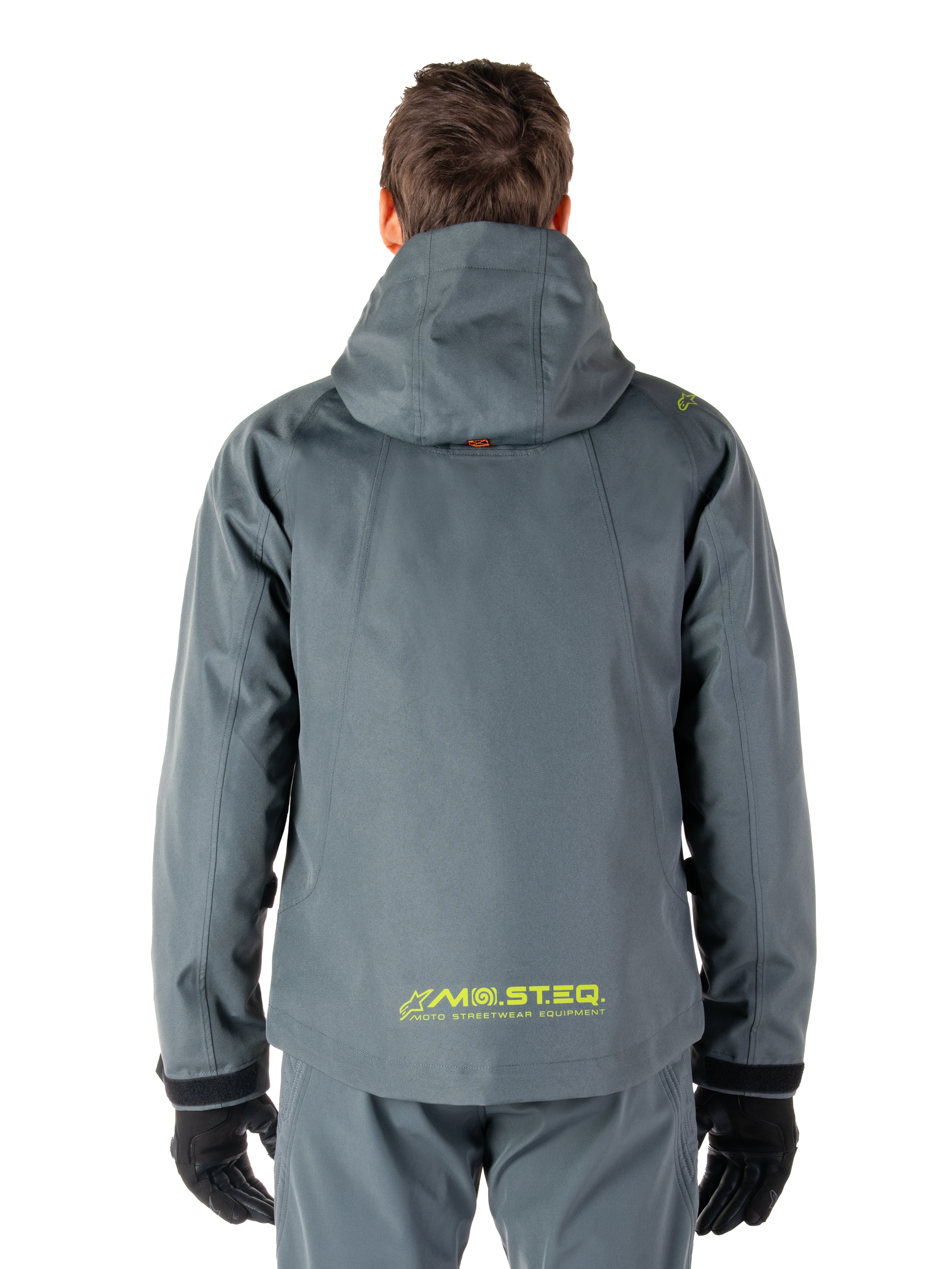 Alpinestars Morush Waterproof Parka, Motorcycle Jacket, Urban Gray, back view showing the hooded design and yellow MO.ST.EQ. logo on the lower back, modern urban streetwear-inspired motorcycle gear