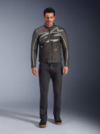 Alpinestars Axton Jacket, Motorcycle Jacket, Black Anthracite Red Tangerine, worn by a model with dark pants, featuring a wrap-around gray Alpinestars logo, red brand patches, and a water-resistant textile shell for urban road riding