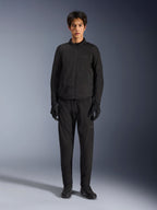 Alpinestars Aeroshell Airflow Jacket, Black motorcycle jacket, worn by model with matching black pants and gloves, featuring laser-perforated chest and side mesh panels, sport-cut fit for warm-weather performance