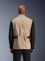 Alpinestars Dice Jacket, Urban Motorcycle Jacket, Aluminum and Black, back view on a model, featuring pleated shoulders for mobility, adjustable waist straps, and a rugged polycotton twill construction.