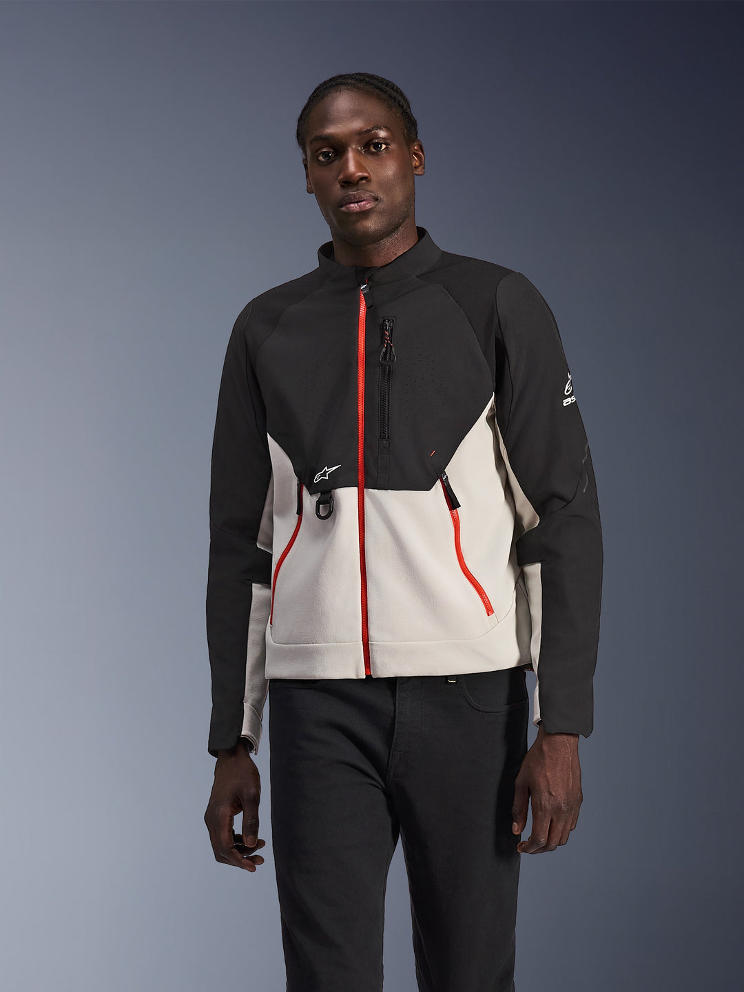 Alpinestars Provoke Jacket, Motorcycle Urban Jacket, Black and Light Gray with vibrant red zippers, high collar, featuring logo details on the chest and sleeve, modern protective street-ready design worn by model