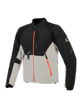 Alpinestars Provoke Jacket, Urban Motorcycle Jacket, Black and Metal Gray with fluorescent red zipper accents, featuring laser-perforated chest panels, ripstop softshell reinforcements, and front D-ring attachment, street-ready design for warm-weather riding