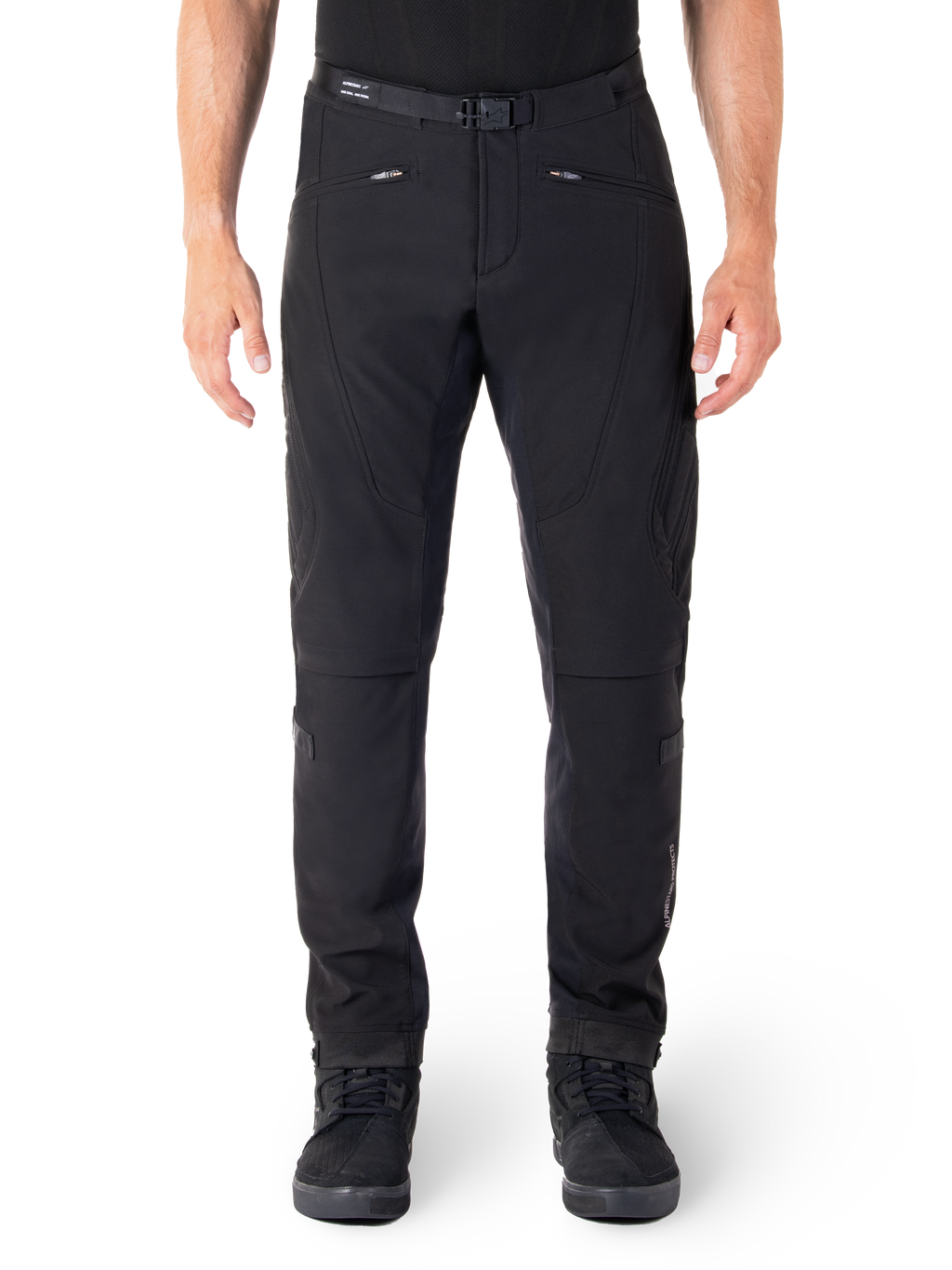 Alpinestars Alden Pants, Black Urban Motorcycle Pants, front view, technical stretch softshell fabric, integrated belt with magnetic buckle, zippered front pockets, quilted knee detailing, slim-fit silhouette, styled with black riding shoes