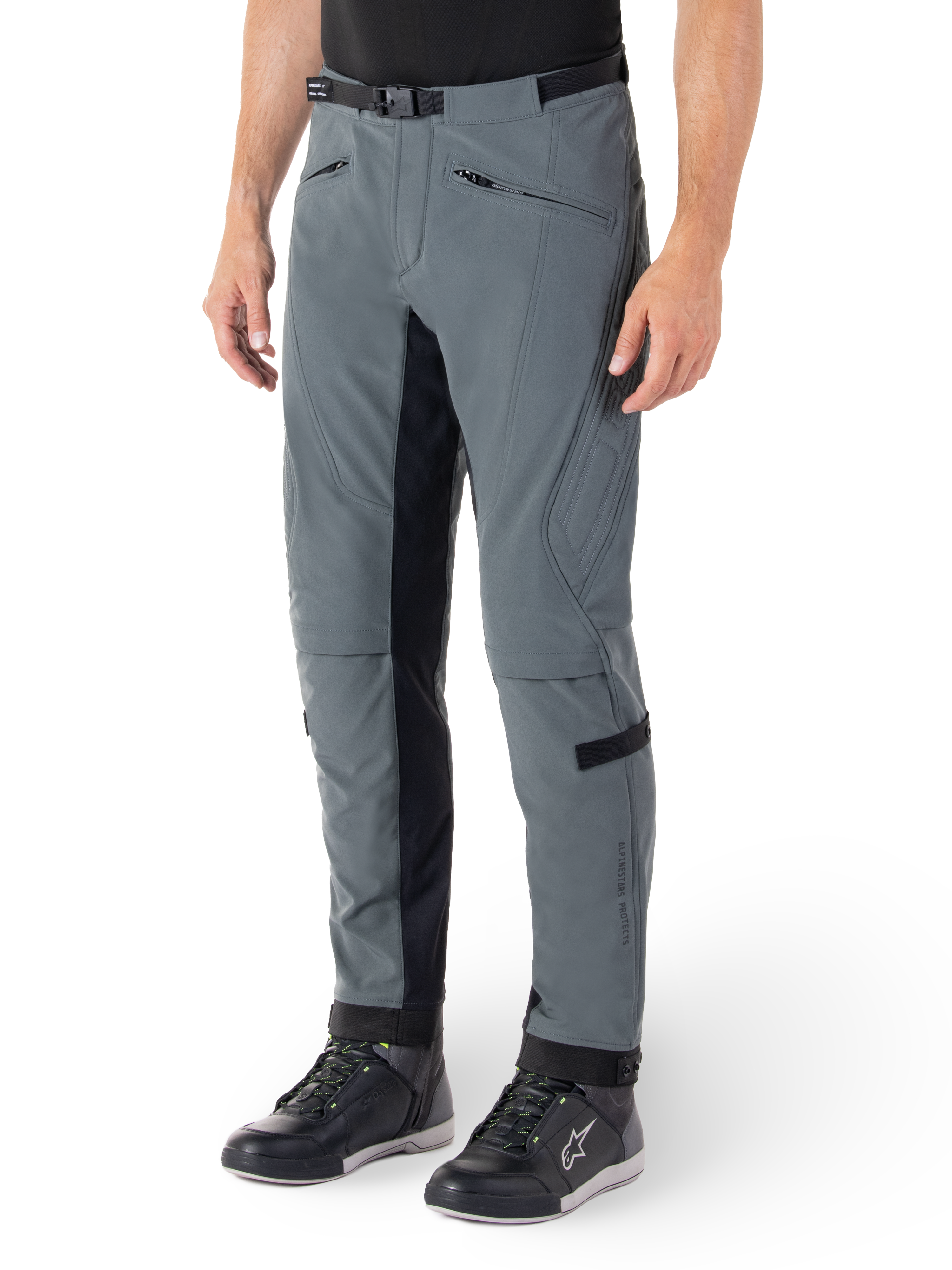Alpinestars Alden Pants, Urban Gray and Black motorcycle pants, streetwear-inspired textile riding pants with 3-layer stretch softshell, black inner leg panels, built-in waist belt, slim fit below the knee, worn with black riding shoes