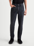Alpinestars Flex-AST 7 Denim Pants, men's urban motorcycle riding jeans in faded black, featuring single-layer A-TRAACX technical denim and AA-certified protection worn by a model.