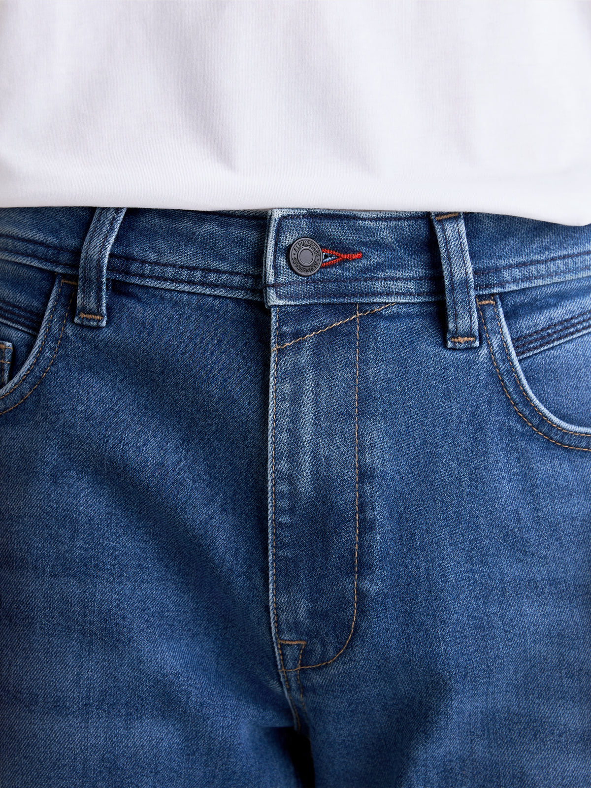Alpinestars Flex-AST 7 Denim Pants, close-up of the waistband, metal button fly, and front pockets, light blue, AA-rated motorcycle riding jeans