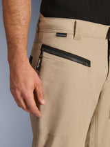 Alpinestars Flex-AST Canvas Pants, Brown, close-up of zippered side pocket with branded pull tab and Alpinestars Protects label, heritage workwear-inspired design, durable stretch polycotton twill material.