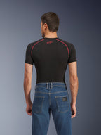 Alpinestars Flex-AST 5 Denim Pants - Short, Indigo Washed blue motorcycle jeans, back view featuring rear pockets and a small black Alpinestars tag, worn with a black compression shirt with red stitching, casual urban riding apparel.