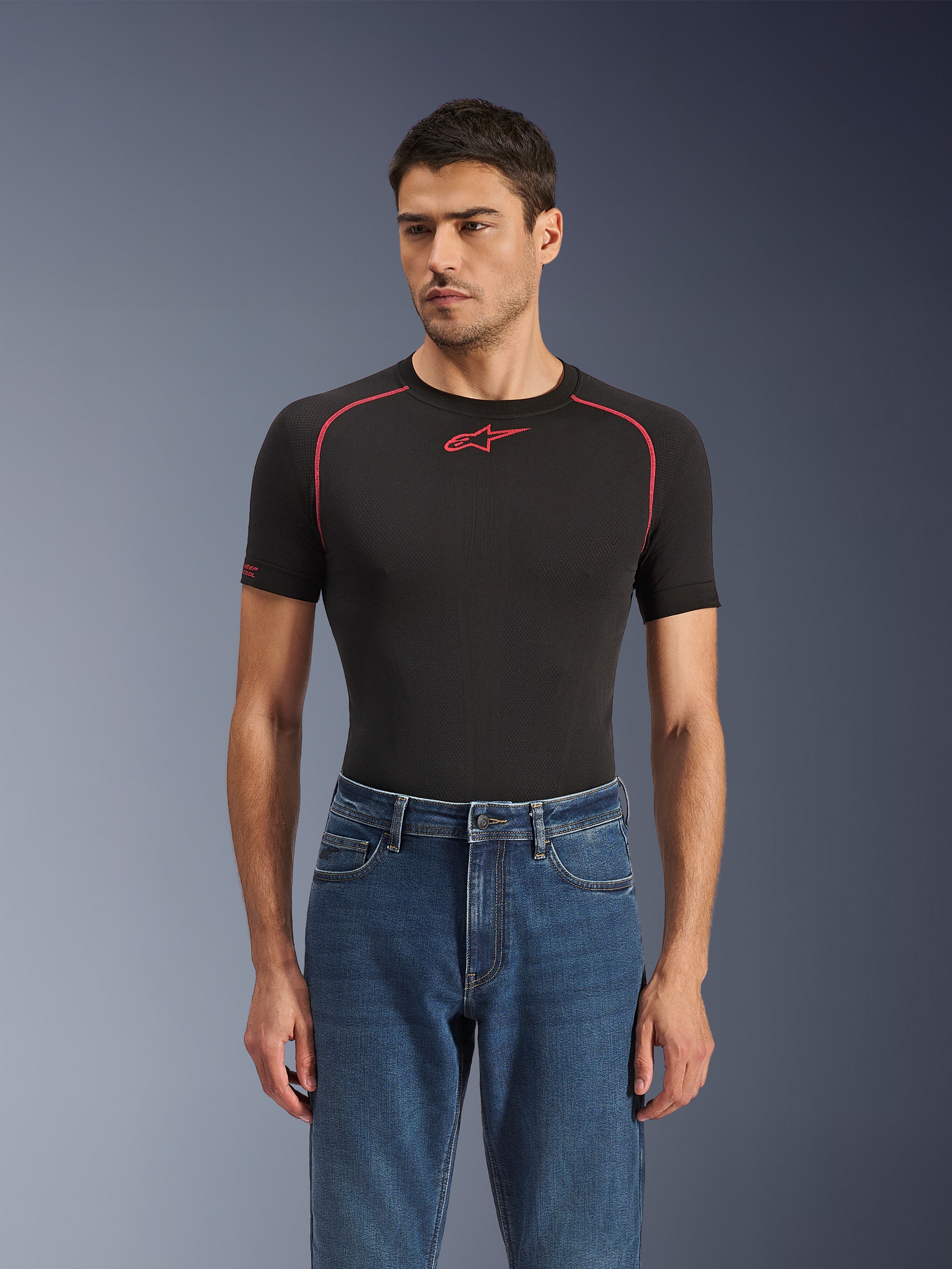 Alpinestars Flex-AST 5 Denim Pants, Indigo Washed, urban motorcycle jeans worn by a model with a black technical base layer, classic five-pocket styling with a modern tapered fit