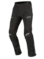 Alpinestars Ramjet Air Pants, Motorcycle Riding Pants, Black, featuring mesh ventilation panels, accordion stretch inserts on the knees, white logos on the thighs and knees, zippered pockets, and durable multi-panel textile construction for road touring
