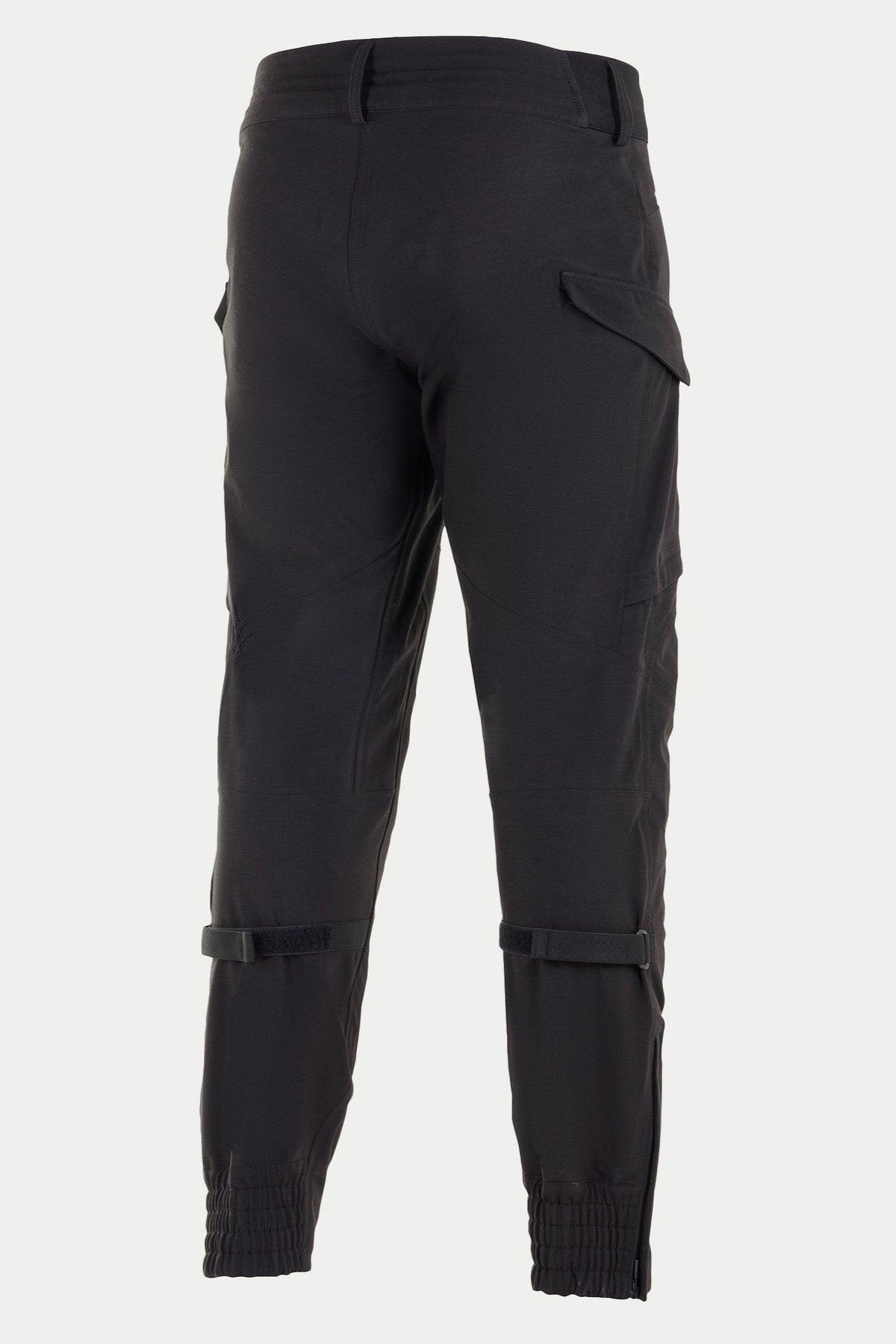 Alpinestars Juggernaut Waterproof Pants, Black Motorcycle Pants, back view featuring elasticated ankle cuffs, calf volume adjusters, and cargo pockets, 3L softshell construction for urban and road riding