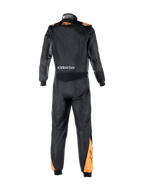 Alpinestars Atom Graphic Suit, FIA-certified one-piece auto racing suit, Black and Fluo Orange, rear view highlighting stretch waist panel, brand logos, and flame-resistant aramidic construction.