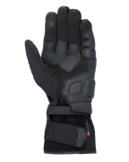 Alpinestars Tourer W-7 V2 Drystar® Gloves, Black motorcycle gloves, palm view featuring leather reinforcements, padded grip areas, touchscreen-compatible fingertip, and secure wrist strap closure.