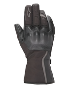 Alpinestars Women Stella Tourer W-7 Drystar® Gloves, Black, backhand view featuring leather-covered hard knuckle protection, long touring cuff with reflective piping, Alpinestars logo on index finger, waterproof textile and leather construction