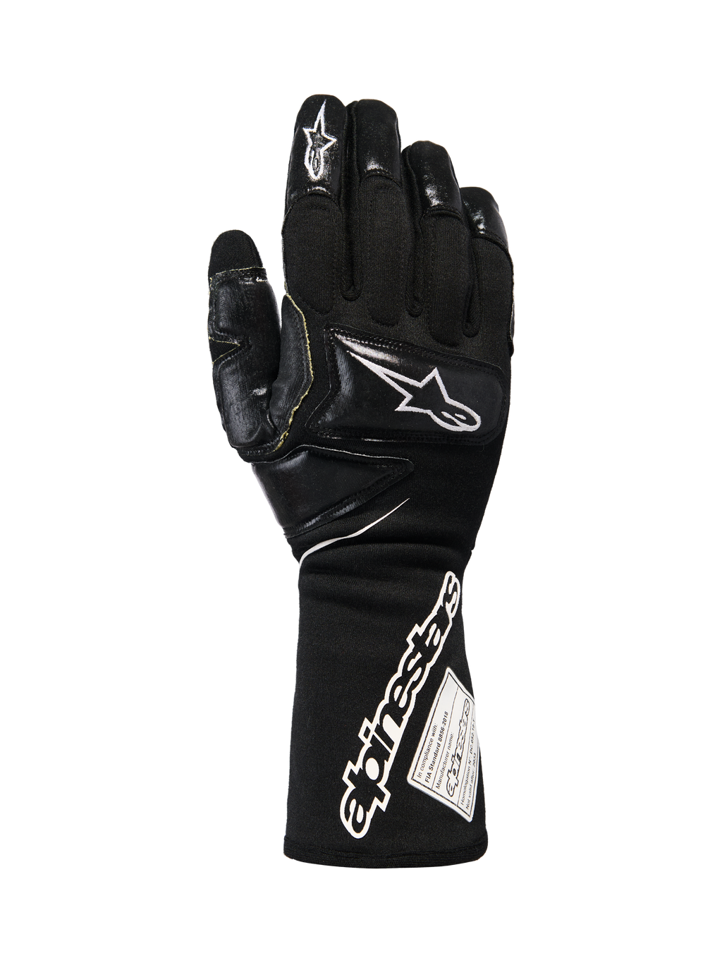 Alpinestars Tech-M V2 Gloves FIA, Black and White Pit-Crew Racing Gloves, featuring an extended cuff with bold Alpinestars branding and FIA certification tag, reinforced knuckle and finger patches for impact protection, professional motorsport gear