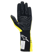 Alpinestars Tech-1 Start V4 Gloves FIA, Auto Racing Gloves, Yellow Fluo and Black, palm view featuring silicone grip patterns, extended cuff with white logo and FIA certification label