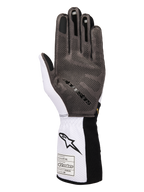 Alpinestars Tech-1 KX V4 Gloves, Karting Gloves, White Black and Gold, palm view showing 3D silicone grip pattern, breathable white mesh construction, and FIA 8877-2022 certification tag on the cuff.