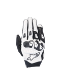 Alpinestars SP X 7 road racing gloves in white and black perforated leather with double-density TPU knuckles.